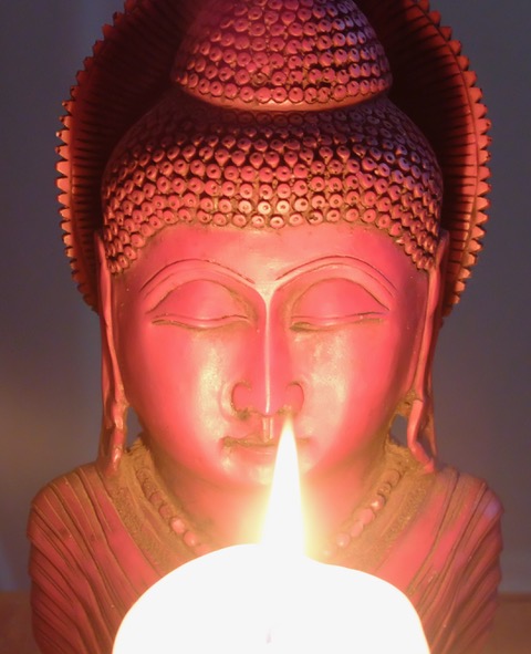 Buddha and candle